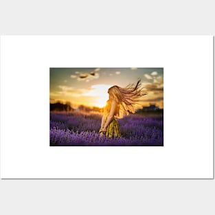 Young woman in blooming lavender field Posters and Art